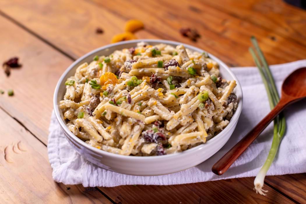 Autumn Pasta Salad that has cranberries, pecans, oranges, poppy seed, chicken salad and pasta